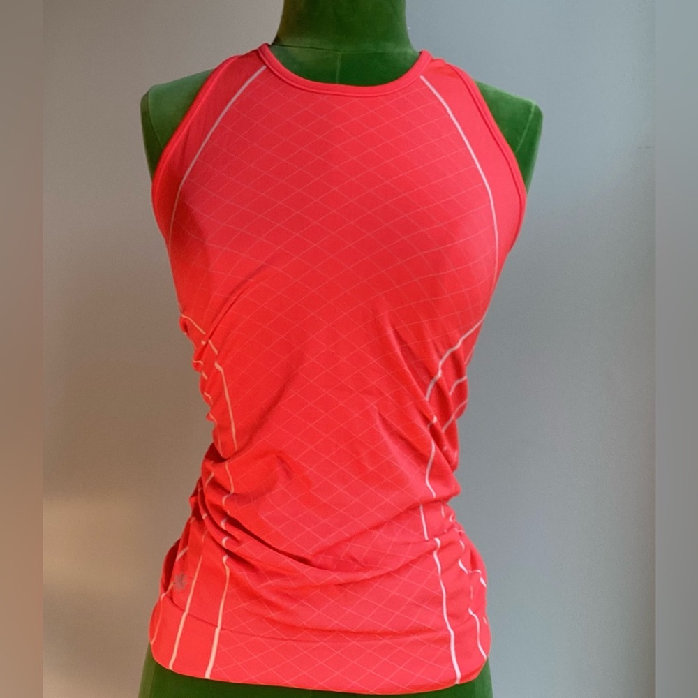 Athleta womens orange fitted sports tank with pleats.